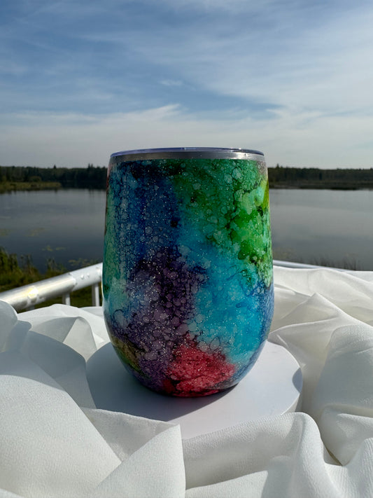 23. 12oz. Rainbow Pool wine tumbler